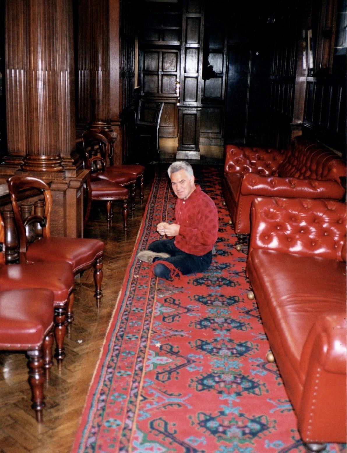 Bahram on a carpet he wove as a replacement for the damaged originals at Stafford County Hall
